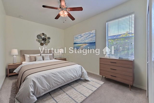 5409 Conch Shell Pl, Apollo Beach, FL 33572 - bedroom with light carpet, baseboards, and a ceiling fan