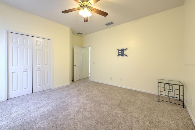 5409 Conch Shell Pl, Apollo Beach, FL 33572 - unfurnished bedroom with baseboards, light carpet, and visible vents