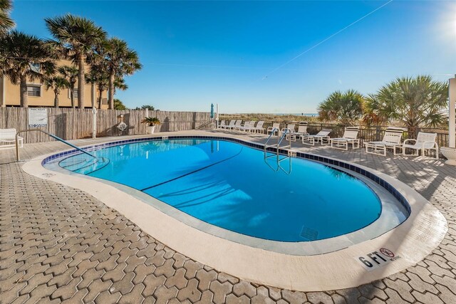 13000 Gulf Blvd Unit 109, Madeira Beach, FL 33708 - community pool with fence and a patio