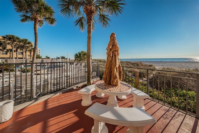 13000 Gulf Blvd Unit 109, Madeira Beach, FL 33708 - deck featuring a beach view and a water view