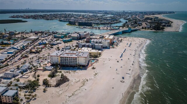 13000 Gulf Blvd Unit 109, Madeira Beach, FL 33708 - drone / aerial view featuring a beach view, a view of city, and a water view