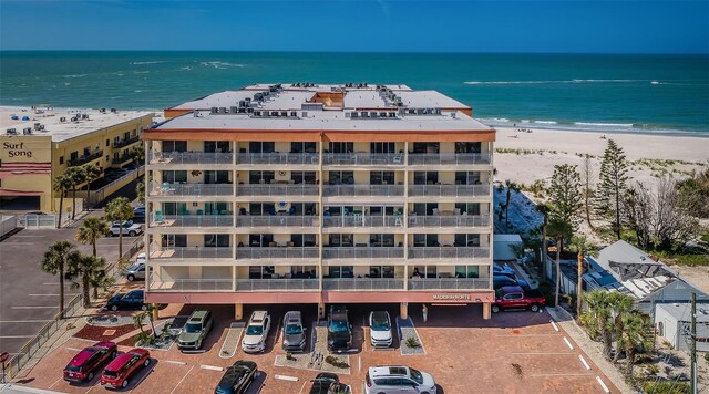 13000 Gulf Blvd Unit 109, Madeira Beach, FL 33708 - view of building exterior featuring a water view and a beach view
