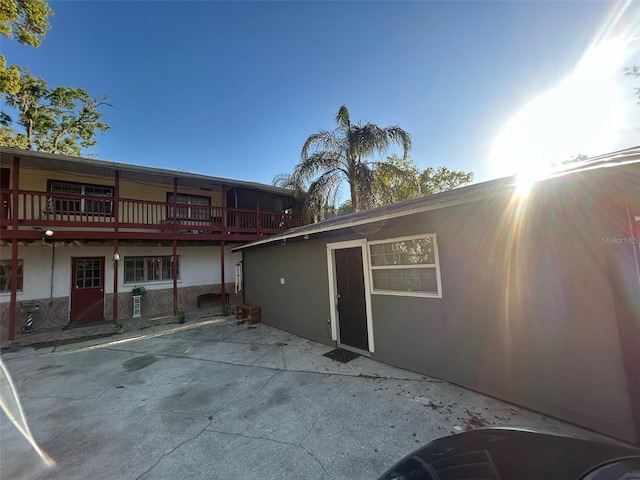 14633 Sassandra Dr, Odessa, FL 33556 - back of property with a patio and stucco siding