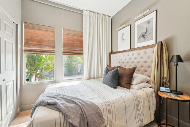 bedroom featuring wood finished floors