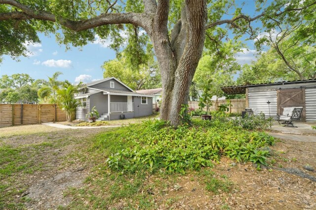 view of yard with a patio and a fenced backyard