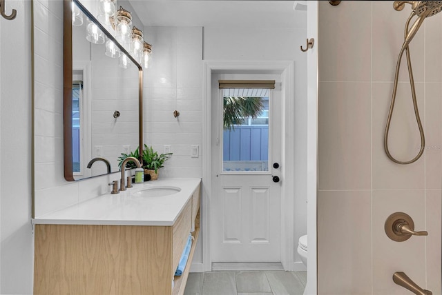 2116/2114 1st St, Indian Rocks Beach, FL 33785 - full bath featuring tile patterned floors, toilet, and vanity