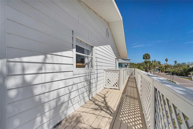 2116/2114 1st St, Indian Rocks Beach, FL 33785 - view of side of home featuring a balcony