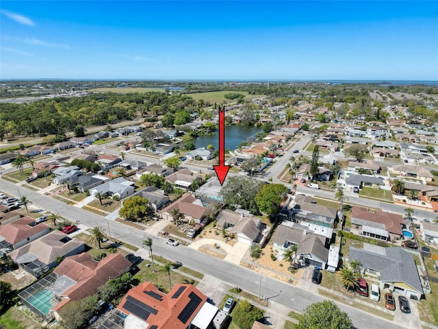 1102 Springtime Dr, Holiday, FL 34691 - birds eye view of property with a residential view and a water view