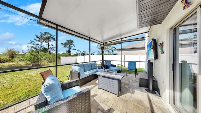 sunroom / solarium featuring an outdoor living space