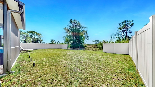 view of yard featuring a fenced backyard
