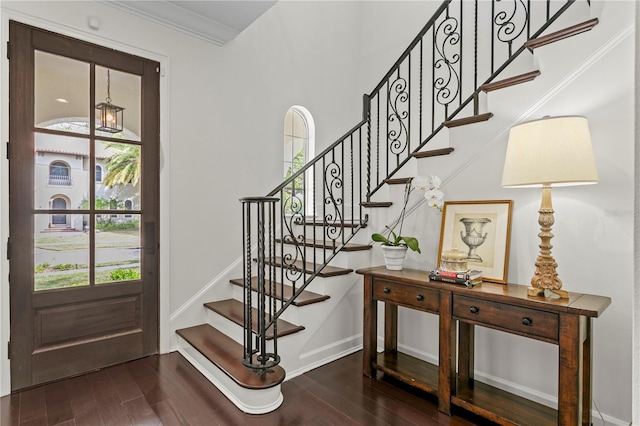 4310 W Sevilla St, Tampa, FL 33629 - foyer featuring baseboards, wood finished floors, ornamental molding, and stairway