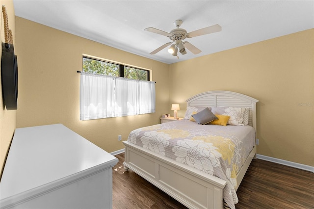 1901 Oyster Catcher Ln Unit 823, Clearwater, FL 33762 - bedroom with baseboards, a ceiling fan, and dark wood finished floors