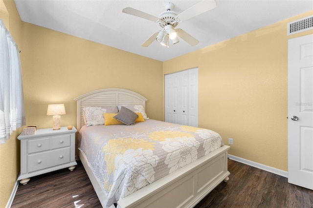 1901 Oyster Catcher Ln Unit 823, Clearwater, FL 33762 - bedroom with baseboards, dark wood-type flooring, a closet, and visible vents