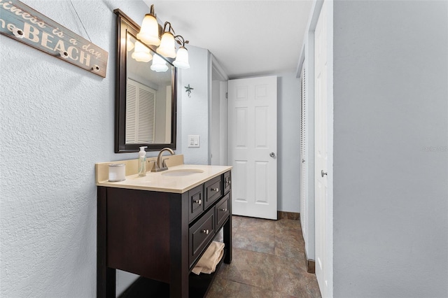 1901 Oyster Catcher Ln Unit 823, Clearwater, FL 33762 - bathroom with baseboards and vanity