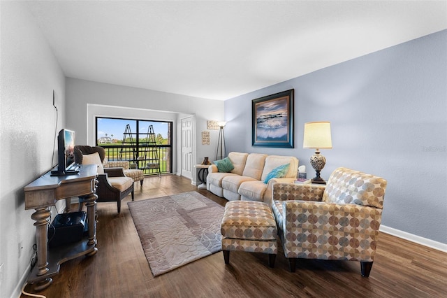 1901 Oyster Catcher Ln Unit 823, Clearwater, FL 33762 - living room with baseboards and wood finished floors