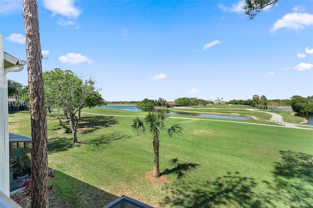 1901 Oyster Catcher Ln Unit 823, Clearwater, FL 33762 - view of home's community with golf course view, a water view, and a yard