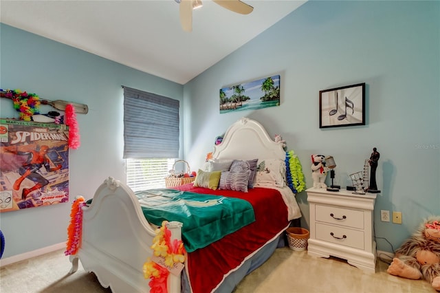 bedroom featuring light colored carpet, vaulted ceiling, and ceiling fan