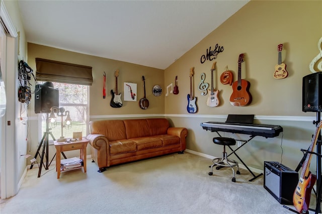 living area featuring carpet floors, baseboards, and vaulted ceiling