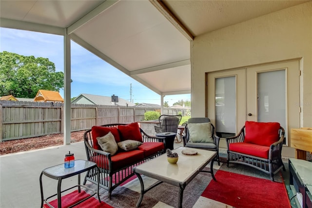 view of patio / terrace with a fenced backyard and an outdoor living space