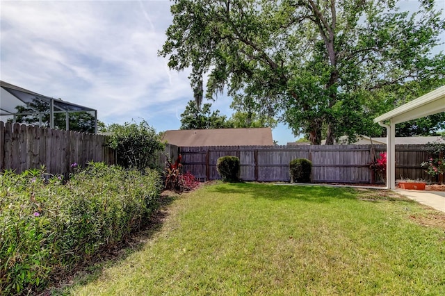 view of yard with a fenced backyard