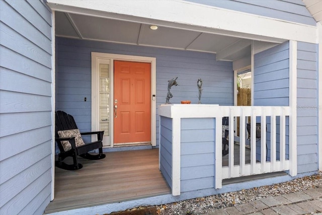doorway to property with covered porch