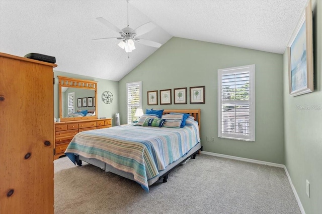bedroom featuring baseboards, carpet flooring, a textured ceiling, and vaulted ceiling