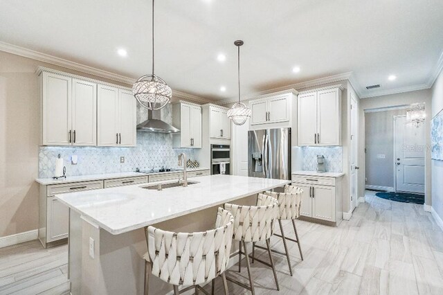 20647 Ovid Ln, Venice, FL 34293 - kitchen featuring ornamental molding, wall chimney exhaust hood, tasteful backsplash, appliances with stainless steel finishes, and a sink