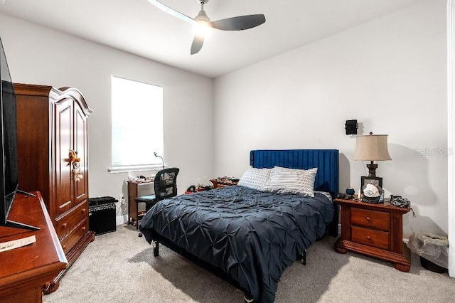 20647 Ovid Ln, Venice, FL 34293 - bedroom featuring a ceiling fan and light carpet
