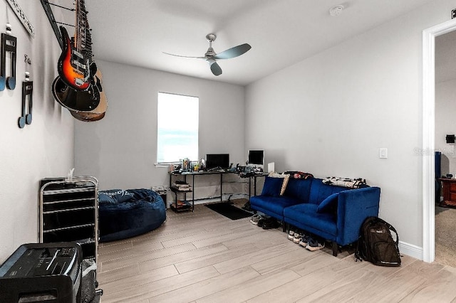 20647 Ovid Ln, Venice, FL 34293 - interior space featuring wood finished floors, baseboards, and ceiling fan