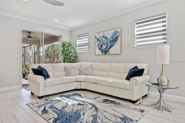 20647 Ovid Ln, Venice, FL 34293 - living area featuring baseboards, light wood-style flooring, ornamental molding, and a ceiling fan