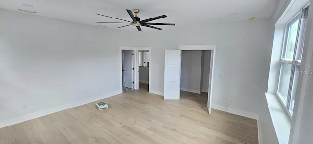 745 31st Ave N, Saint Petersburg, FL 33704 - unfurnished bedroom featuring light wood-type flooring and ceiling fan