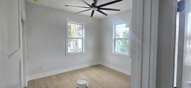 745 31st Ave N, Saint Petersburg, FL 33704 - unfurnished room with plenty of natural light, light wood-style floors, and a ceiling fan