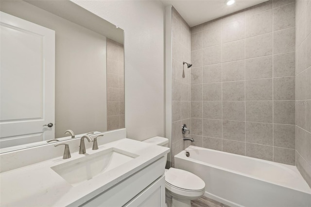 17800 Solstice Ave, Venice, FL 34293 - bathroom featuring vanity, shower / bathing tub combination, and toilet