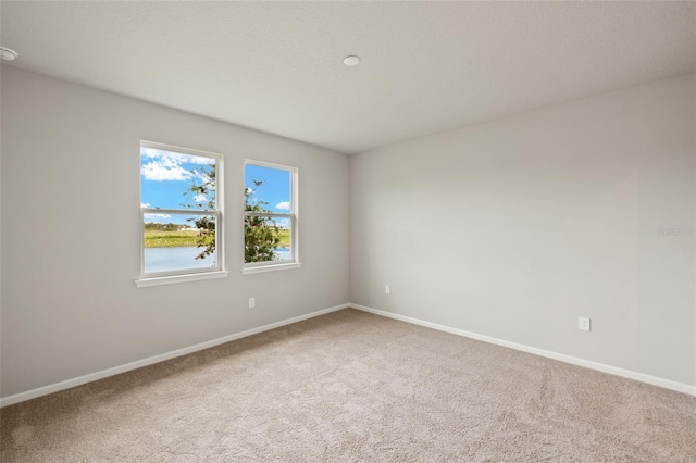 17800 Solstice Ave, Venice, FL 34293 - carpeted spare room featuring baseboards