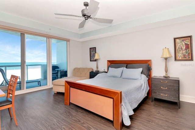 1350 Gulf Blvd Unit 301, Clearwater Beach, FL 33767 - bedroom with baseboards, a ceiling fan, wood finished floors, and access to outside
