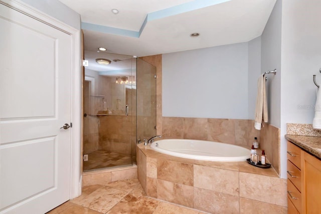 1350 Gulf Blvd Unit 301, Clearwater Beach, FL 33767 - full bathroom with recessed lighting, a shower stall, a garden tub, and vanity