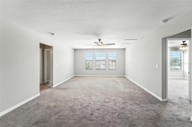 14050 Arbor Pines Dr, Riverview, FL 33579 - empty room featuring a smoke detector, carpet floors, ceiling fan, and a textured ceiling