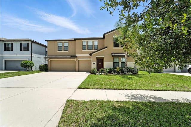14050 Arbor Pines Dr, Riverview, FL 33579 - view of front of home featuring a garage, stucco siding, driveway, and a front lawn