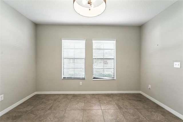 14050 Arbor Pines Dr, Riverview, FL 33579 - empty room featuring baseboards and tile patterned floors