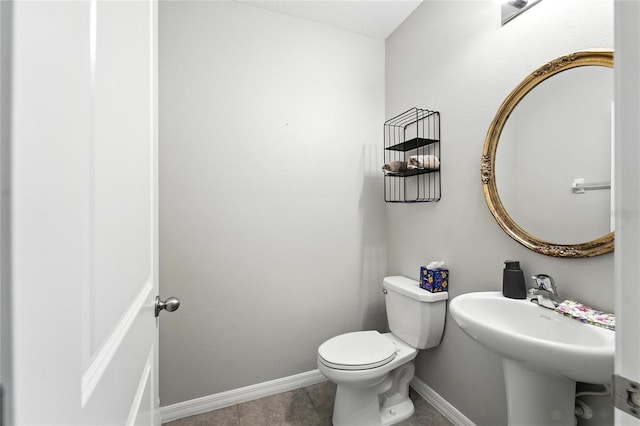 14050 Arbor Pines Dr, Riverview, FL 33579 - bathroom with baseboards and toilet