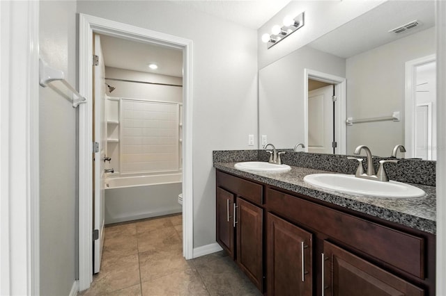 14050 Arbor Pines Dr, Riverview, FL 33579 - bathroom with double vanity, tile patterned flooring, and shower / washtub combination
