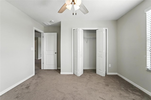 14050 Arbor Pines Dr, Riverview, FL 33579 - unfurnished bedroom featuring carpet flooring, a closet, and a ceiling fan