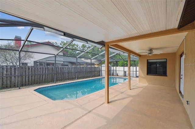 view of pool with a ceiling fan, a patio area, a fenced in pool, and a fenced backyard