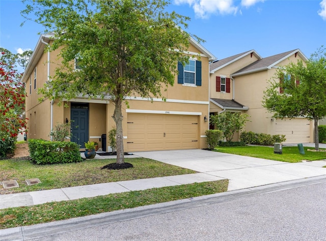 5946 81st Ave N, Pinellas Park, FL 33781 - view of front of home with a front yard, concrete driveway, stucco siding, and an attached garage