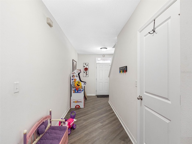 5946 81st Ave N, Pinellas Park, FL 33781 - hall featuring baseboards and wood finished floors