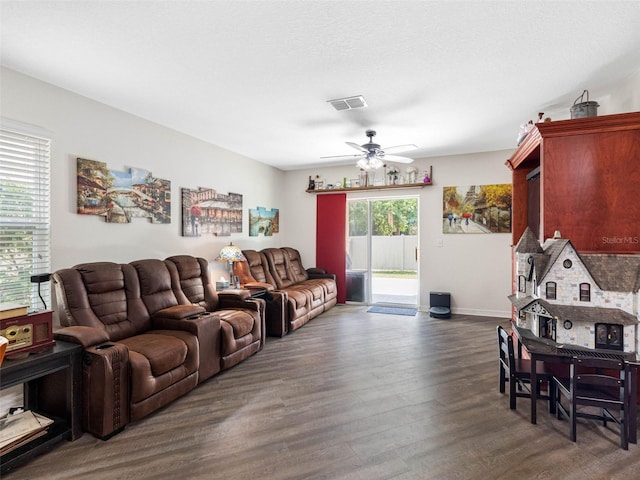 5946 81st Ave N, Pinellas Park, FL 33781 - living area featuring baseboards, visible vents, wood finished floors, and ceiling fan