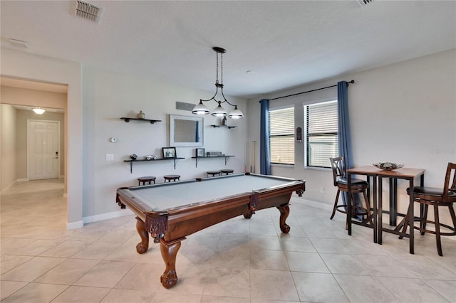 recreation room featuring light tile patterned floors, visible vents, baseboards, and pool table