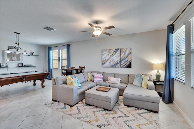 living room featuring light tile patterned floors, ceiling fan, visible vents, pool table, and baseboards
