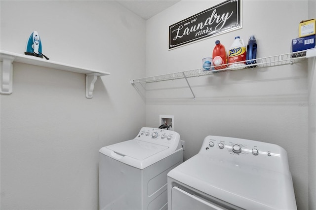 laundry area featuring laundry area and washing machine and dryer