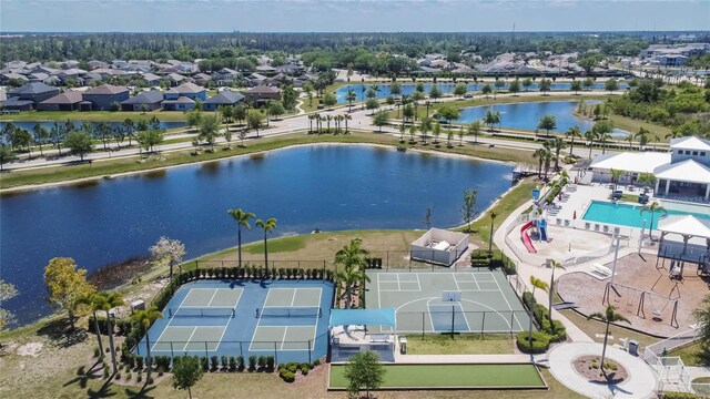 bird's eye view with a water view and a residential view